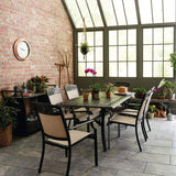 Hanover 6 Sling Stationary Chairs and 39 in. x 68 in. Cast-Top Table in Tan Lisbon 7-Piece Outdoor Dining Set