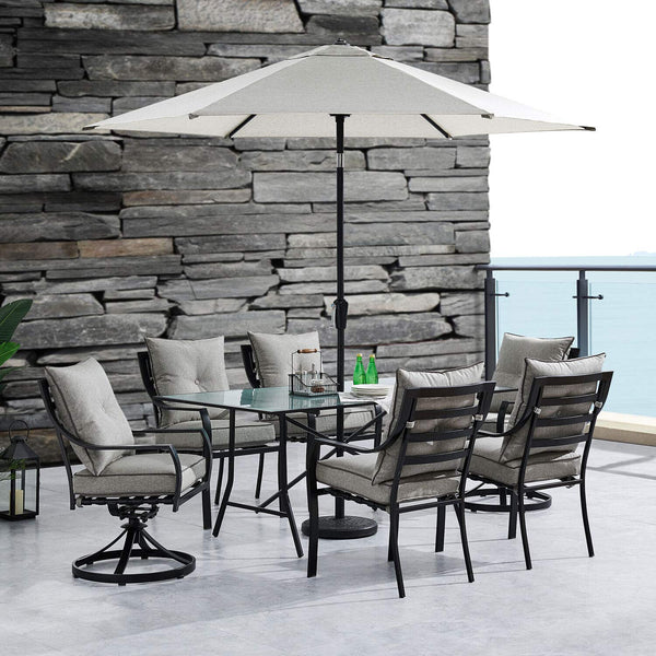 Hanover Lavallette 7-Piece Modern Outdoor Dining Set with Umbrella | 6 Cushioned Swivel Rocker Chairs | 66'' x 38'' Glass-Top Table | Weather Resistant Frame | Silver |LAVDN7PCSW-SLV-SU